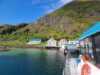 Tinden old trading post seen from a boat. 