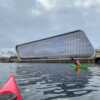 Paddeling nearby the new Hurtigruten Museum in Stokmarknes