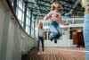 Girls with jumping rope on the deck of MS Finnmarken.